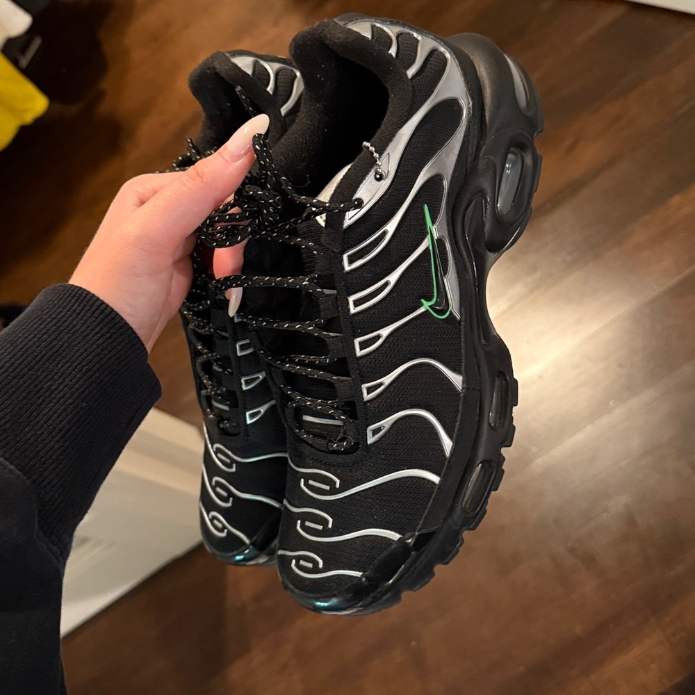 Black and Silver Nike Air Max plus Sneakers with Green Accents